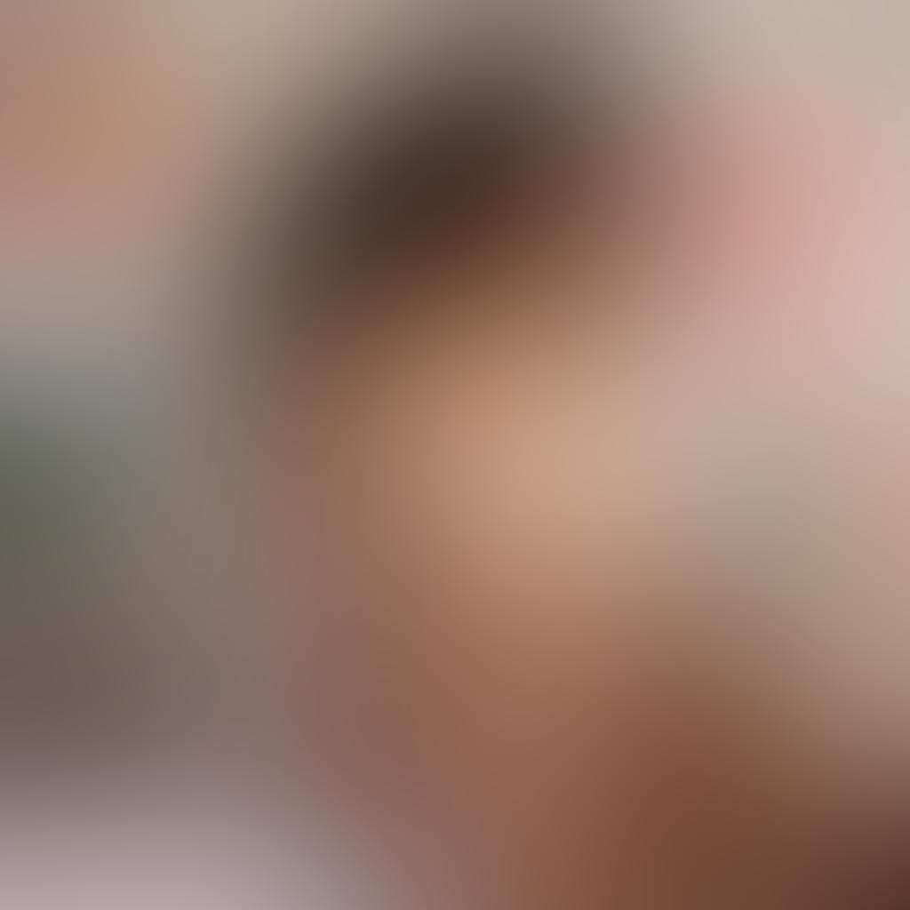 A soft, intimate scene featuring diverse women of different body types and ethnicities, exploring their personal expression through art—drawing, painting, and sculpting representations of breasts in a warm, inviting studio filled with natural light. The atmosphere is serene, with calming colors and abstract art embellishing the walls, symbolizing body positivity and self-love. super-realistic. soft pastel colors. warm lighting.